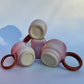 Rosy Rusty Swerve Handle Mug