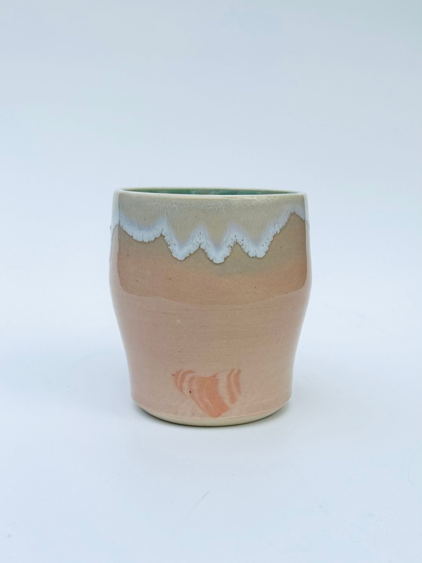 Head on view of the rare Nerikome Heart Tumbler from Rita Strayer Ceramics of Savannah. Subtle heart motif. Suitable cup for milk, nightstand water, wine, whiskey & juice. Various colors in this design.